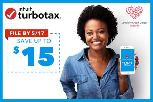 Woman holding a phone showing Turbo Tax