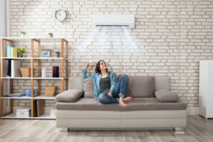woman enjoying the air conditioner