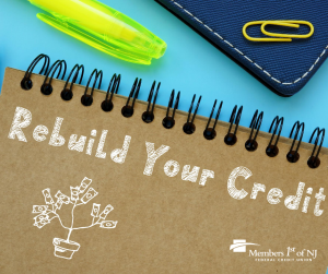 Notepad with rebuild your credit written